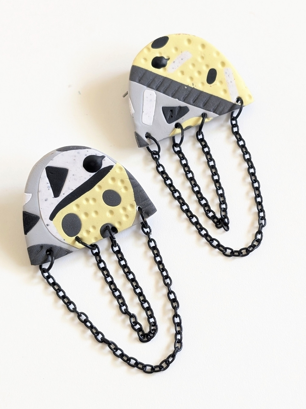 Yellow & Gray Abstract Earrings With Chain Accents